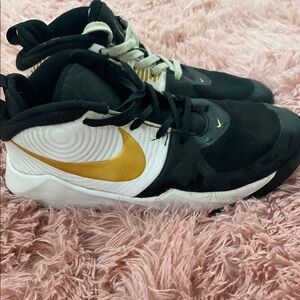 Nike Black and Gold Mid-Top Sneakers